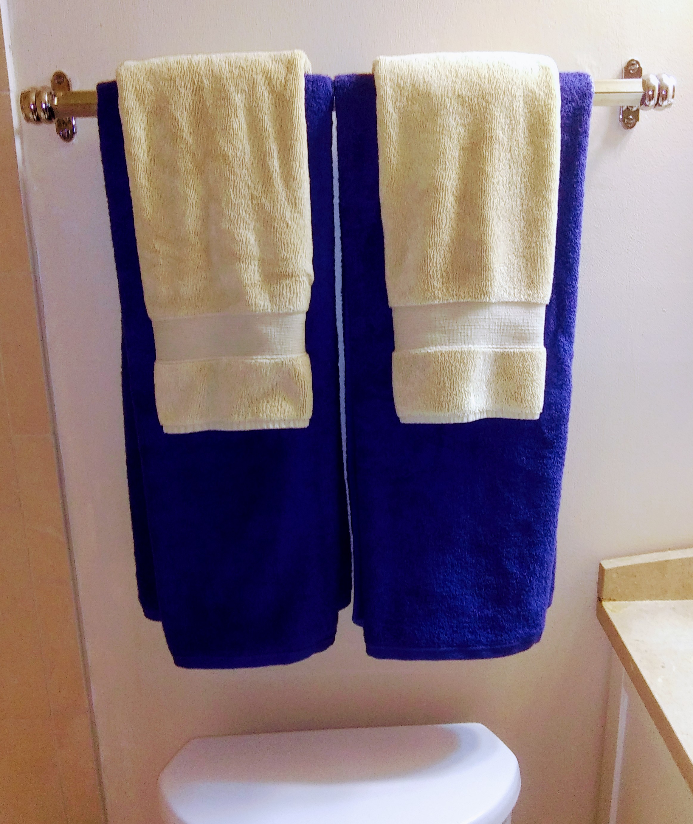 Blue and Off White Towels on Pottery Barn Towel Rack