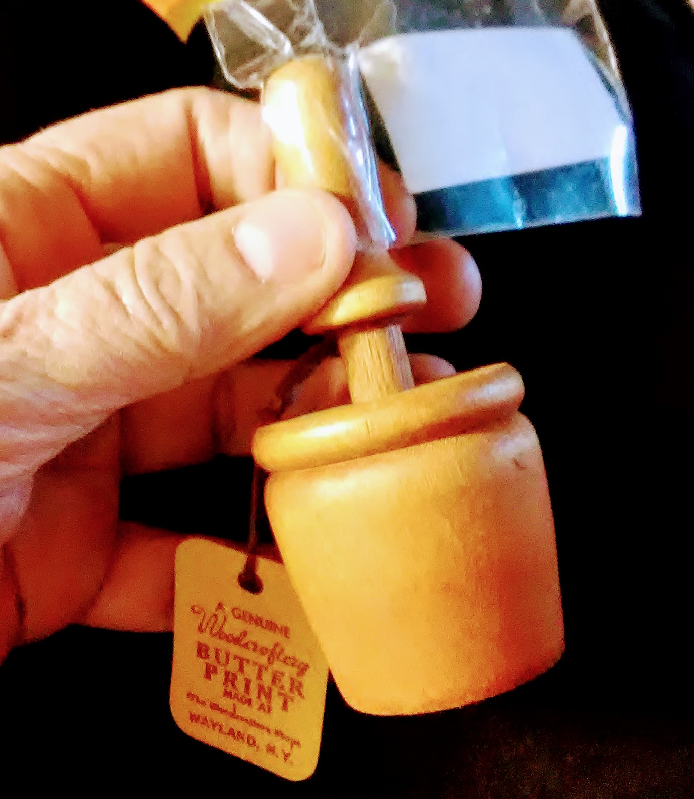 Side View of Small Wooden Butter Press