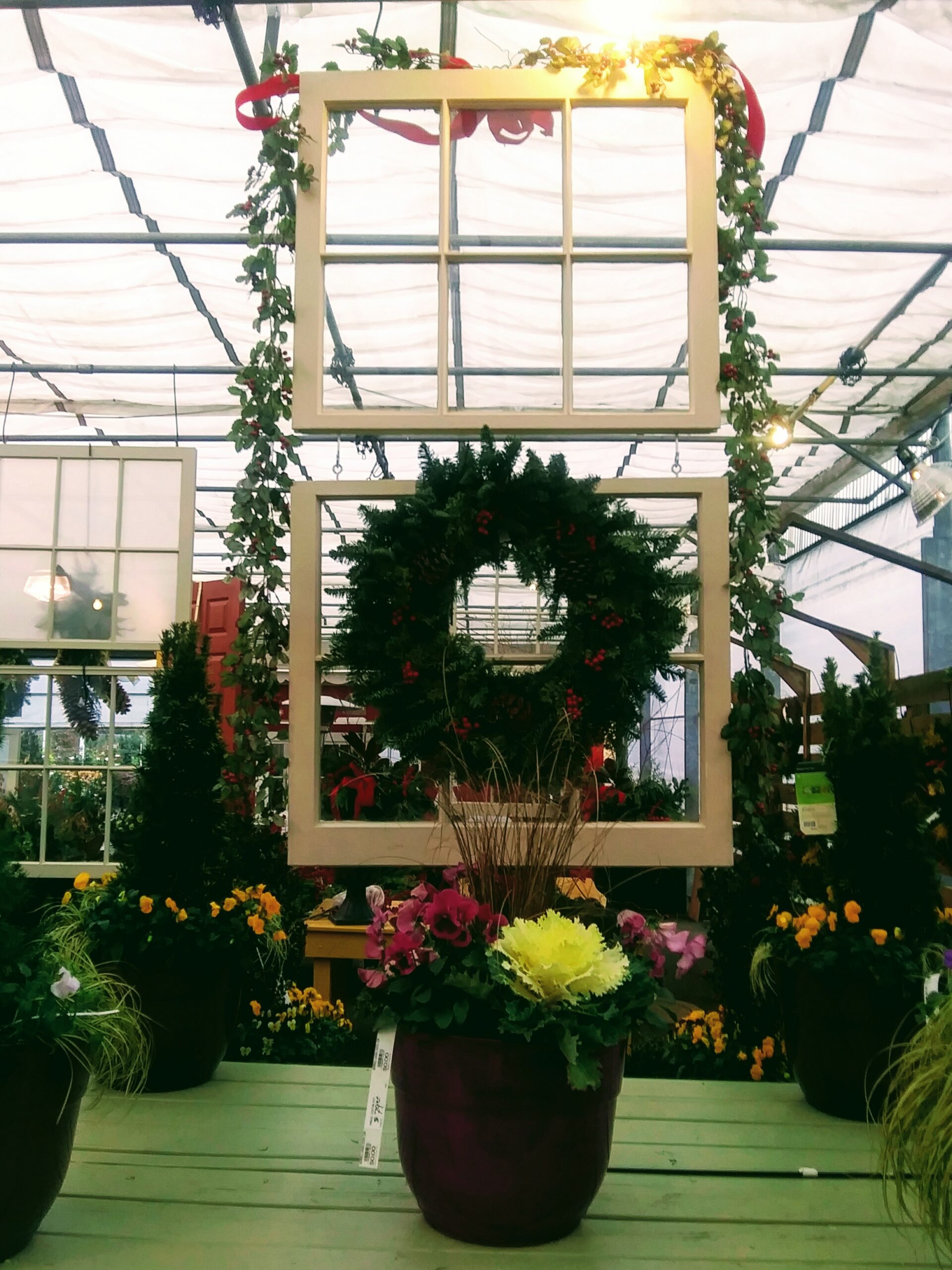 Fresh Wreath Display in Old Window Frame