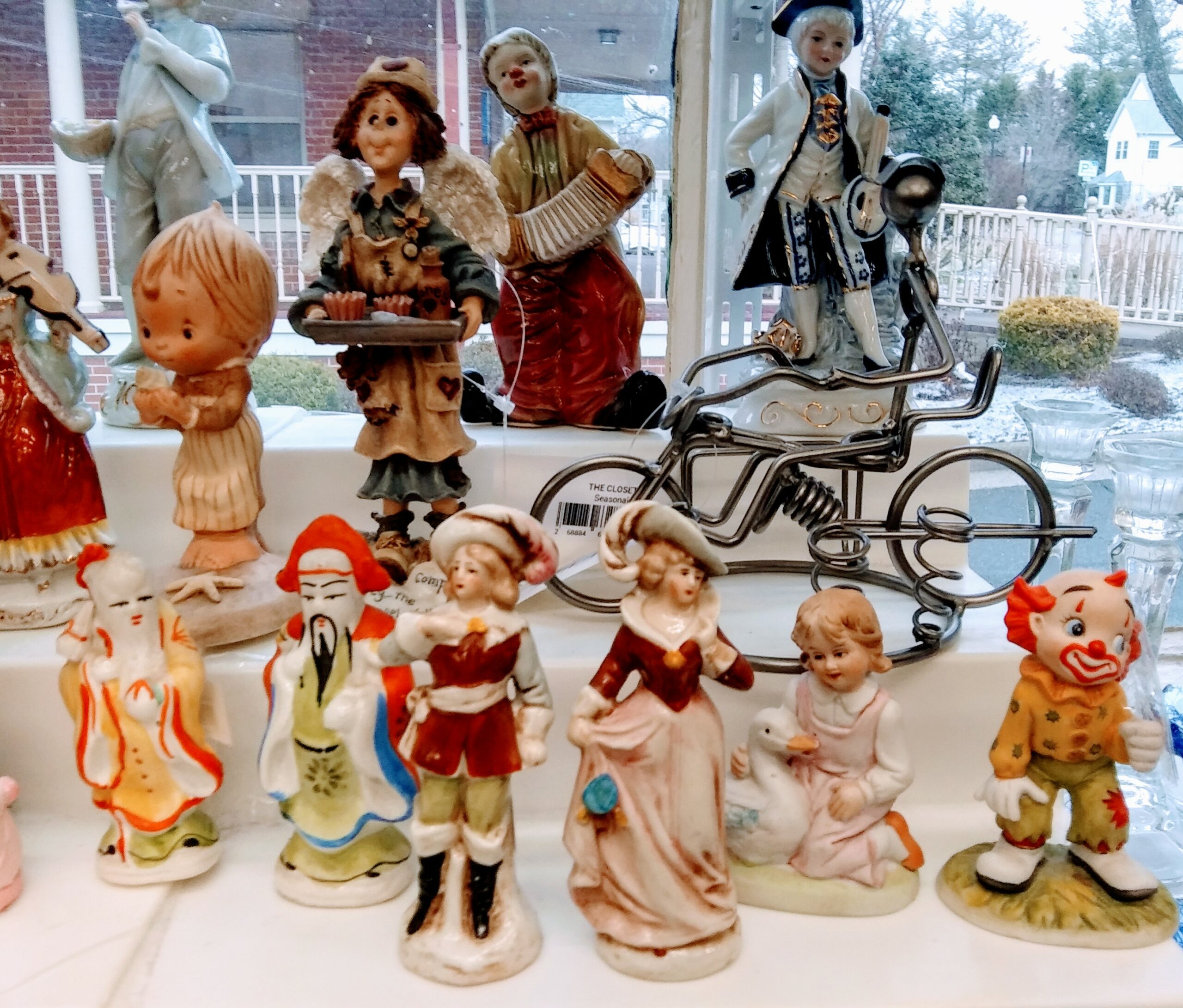 Porcelain Figurines with a Motorcycle Work of Art