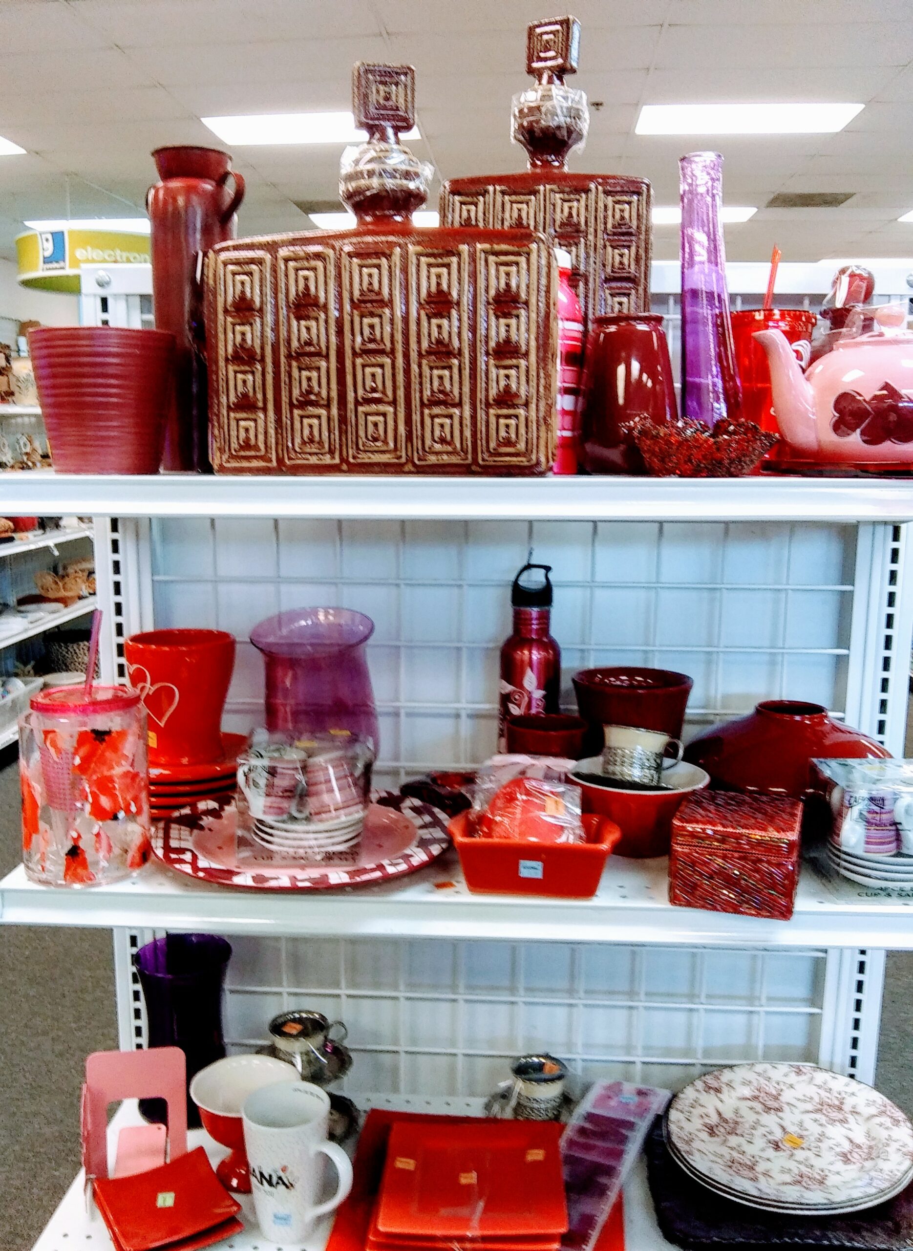 Shelves of Red Colored Home Goods