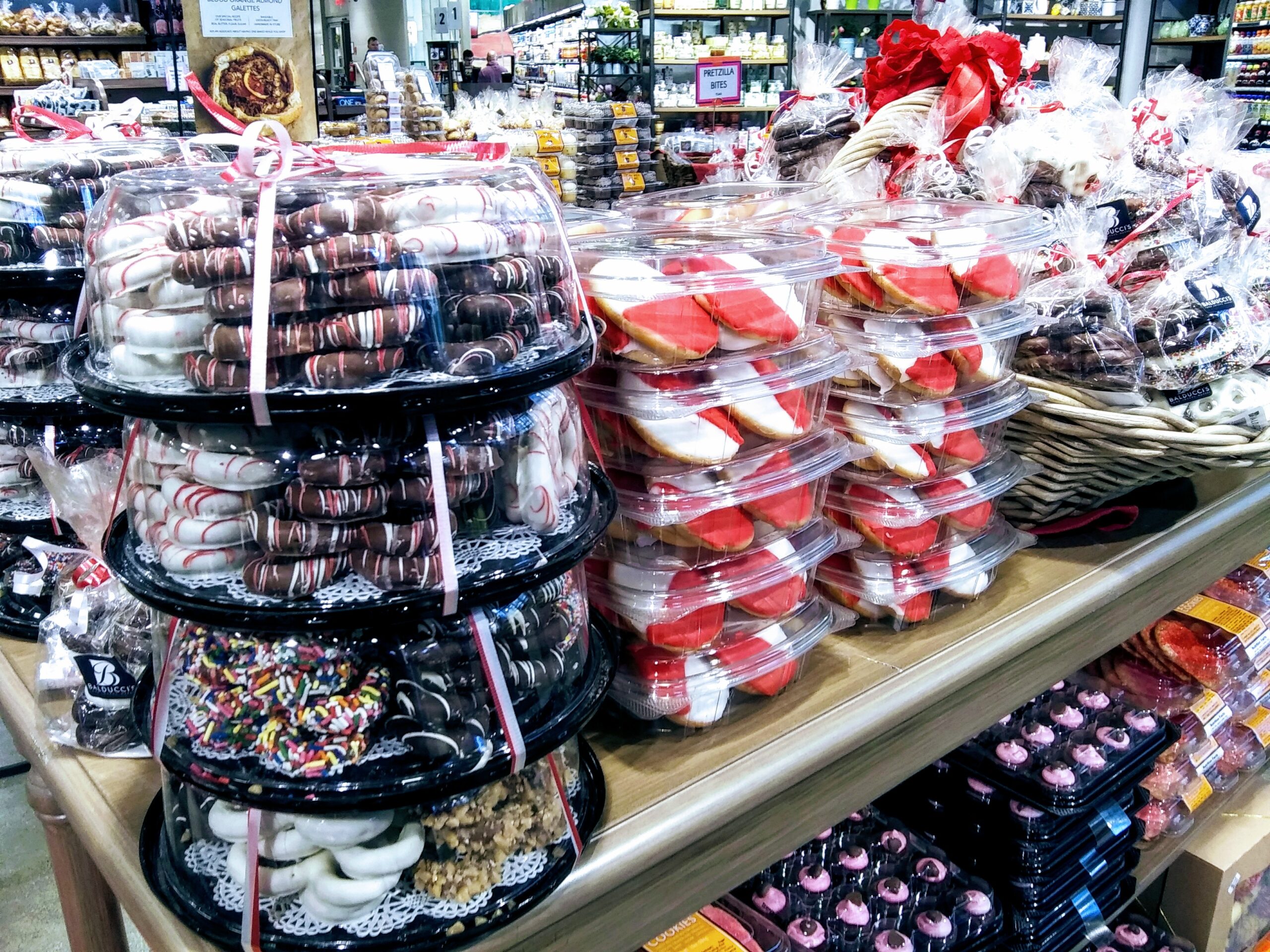 Packages of Freshly Made Cookies and Chocolatge Covered Pretzels