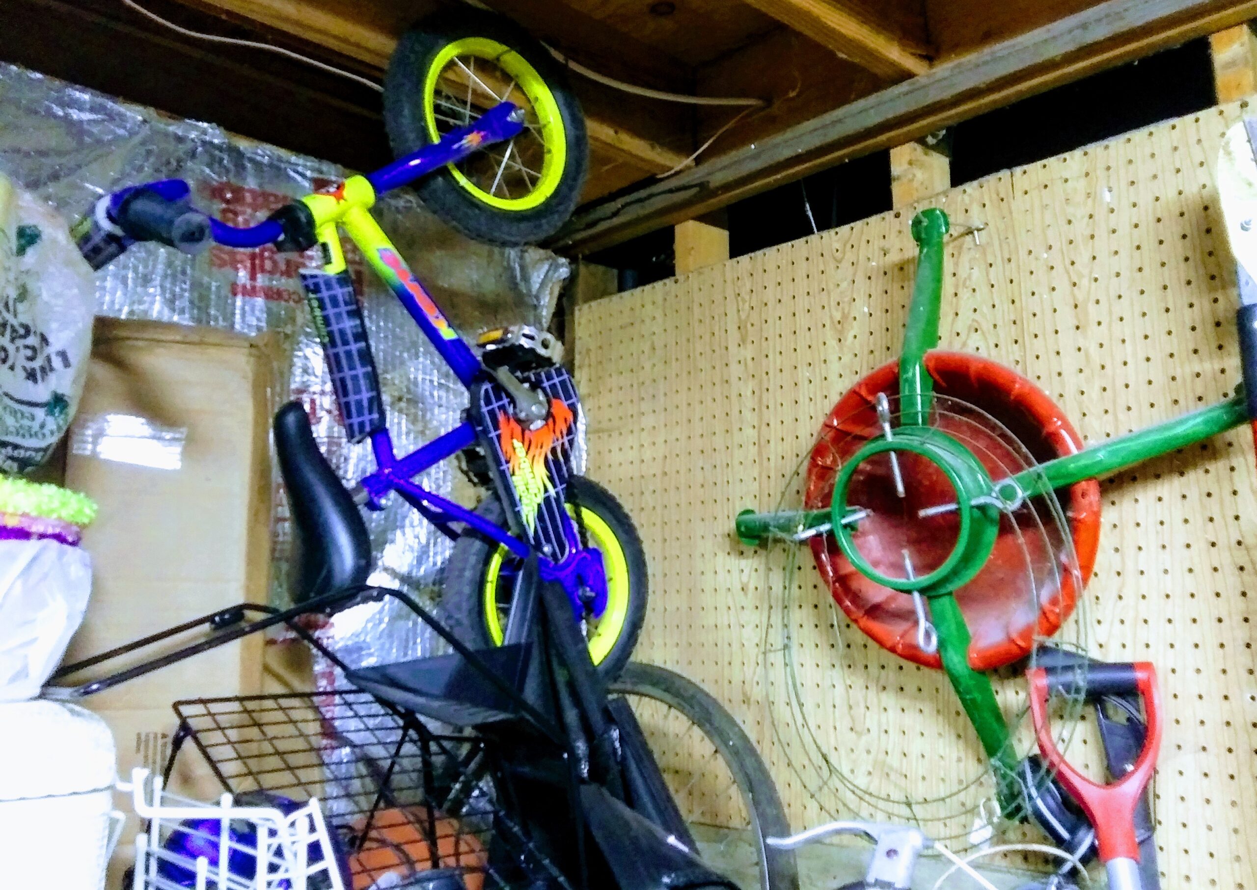 Child's Bike Hanging from Ceiling