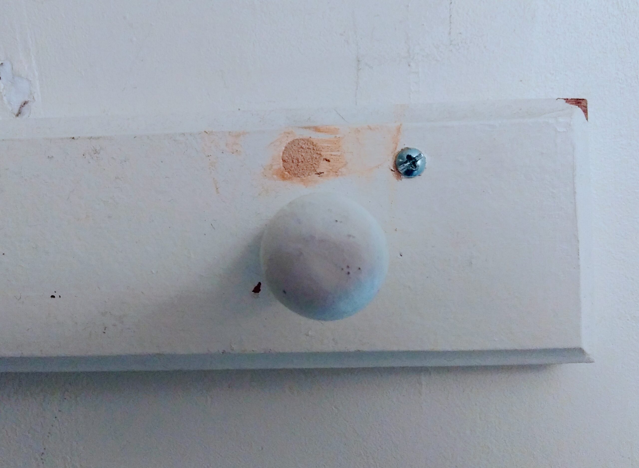 Hole in Coat Rack Filled in with Wood Putty