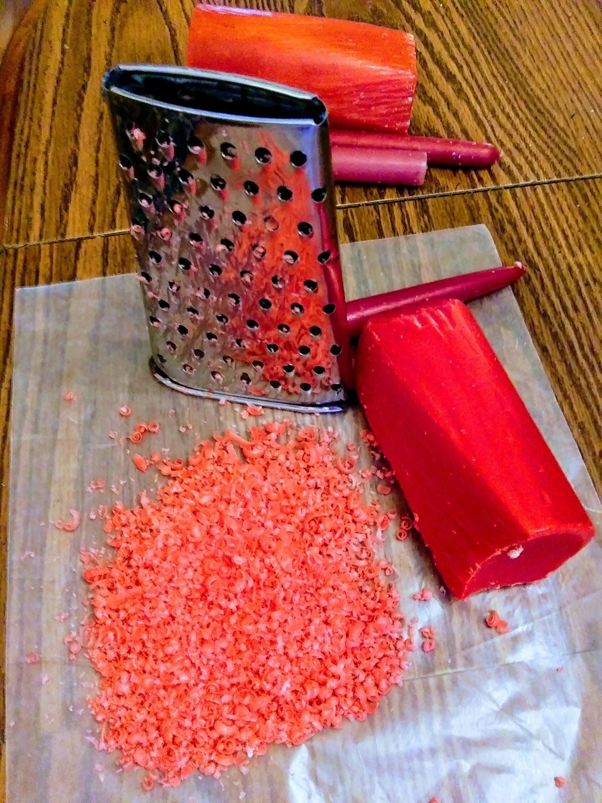 Using a Cheese Grater on a Red Candle