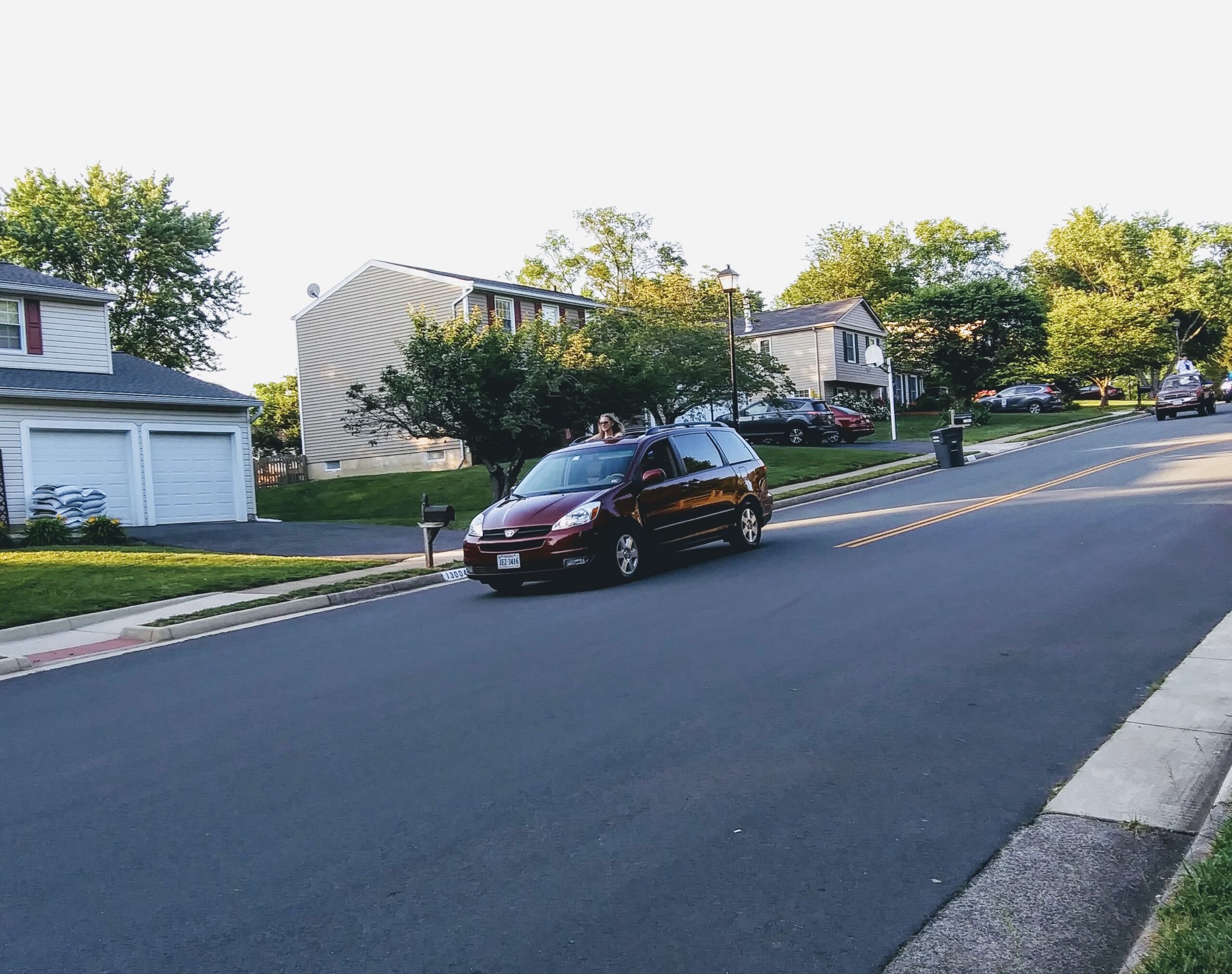 Grad in Maroon Van