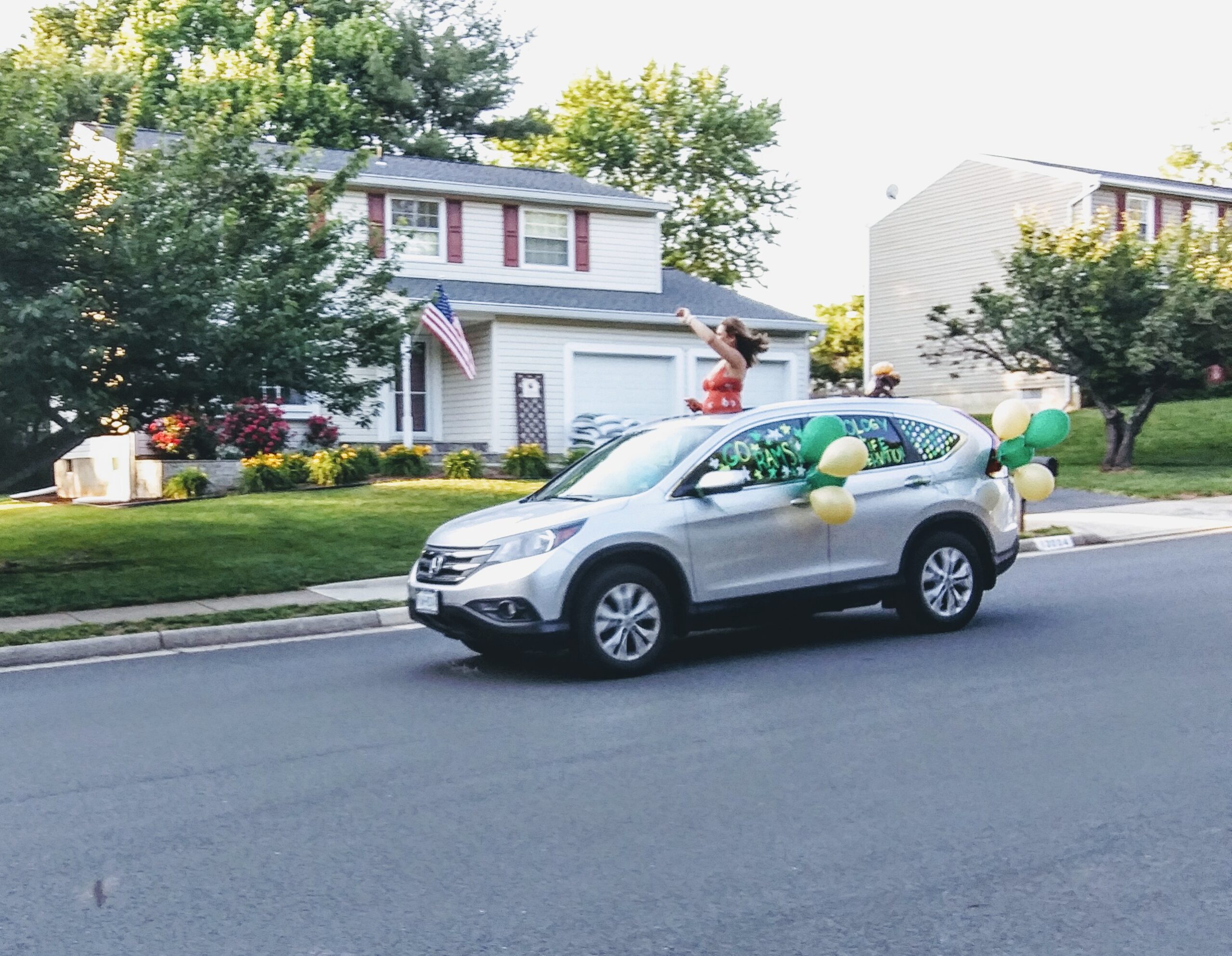 silver Car Decorated with Balloons