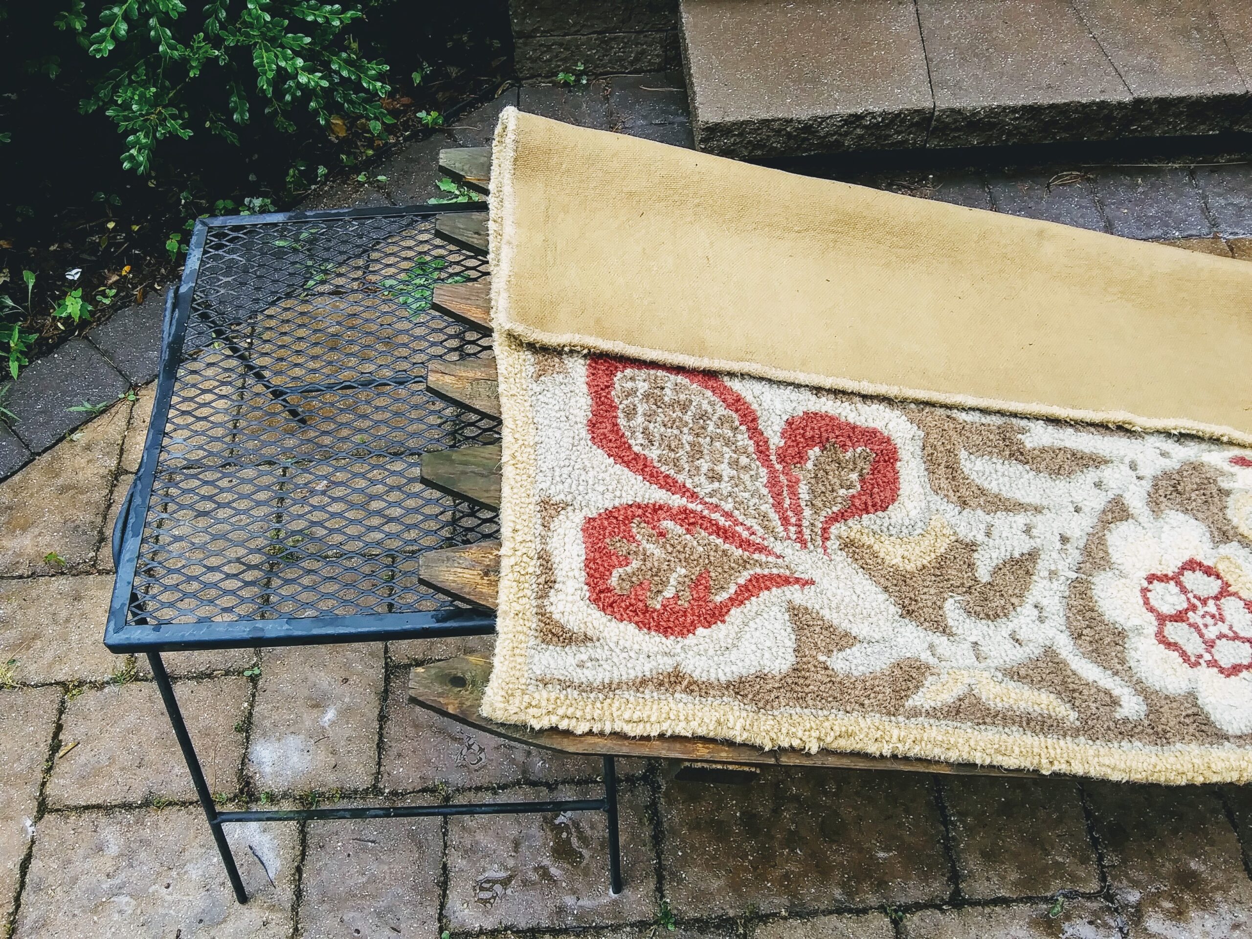 Wool Rug Drying on Wooden Boards