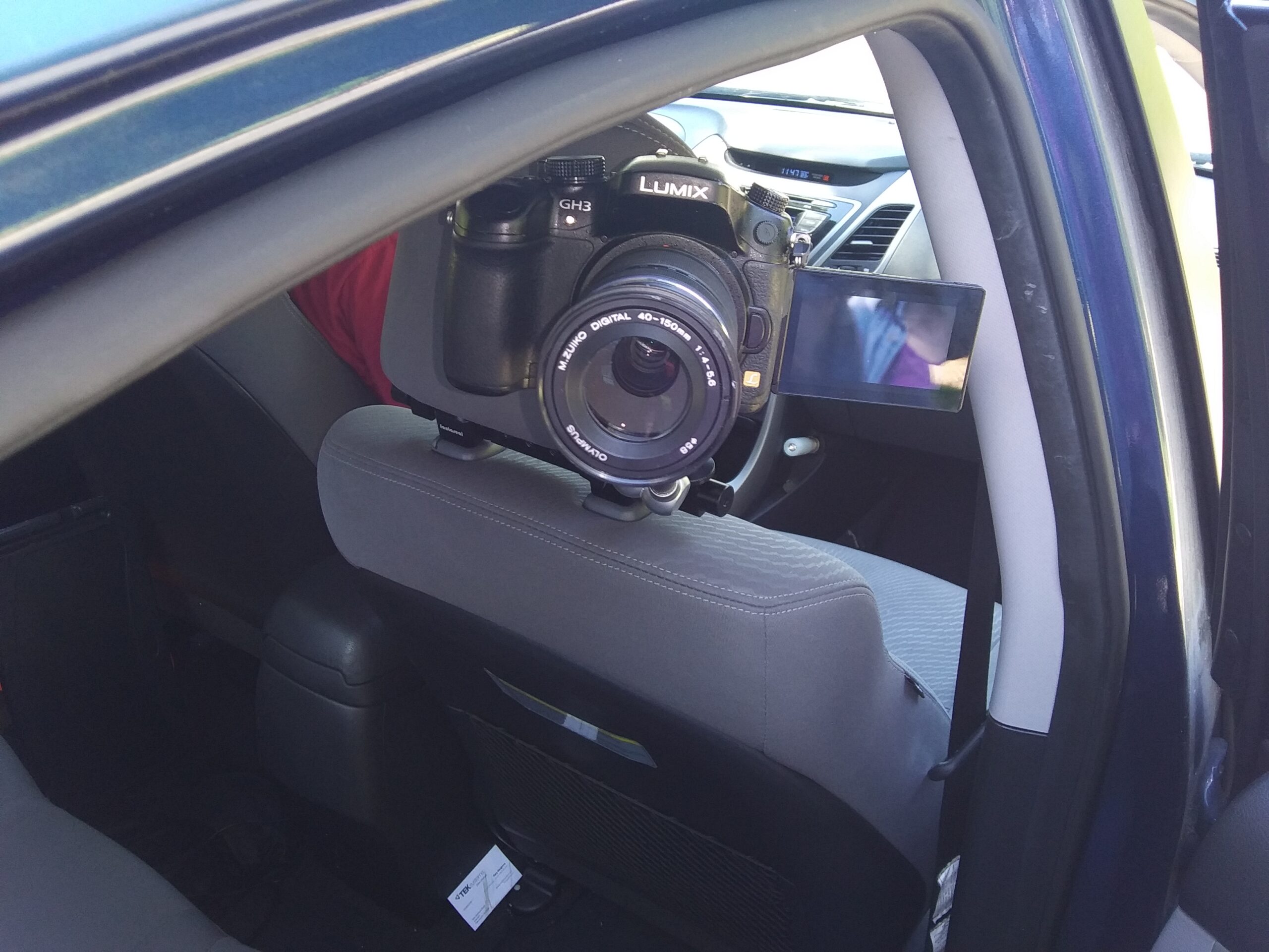 Camera Facing Out the Side Car Window