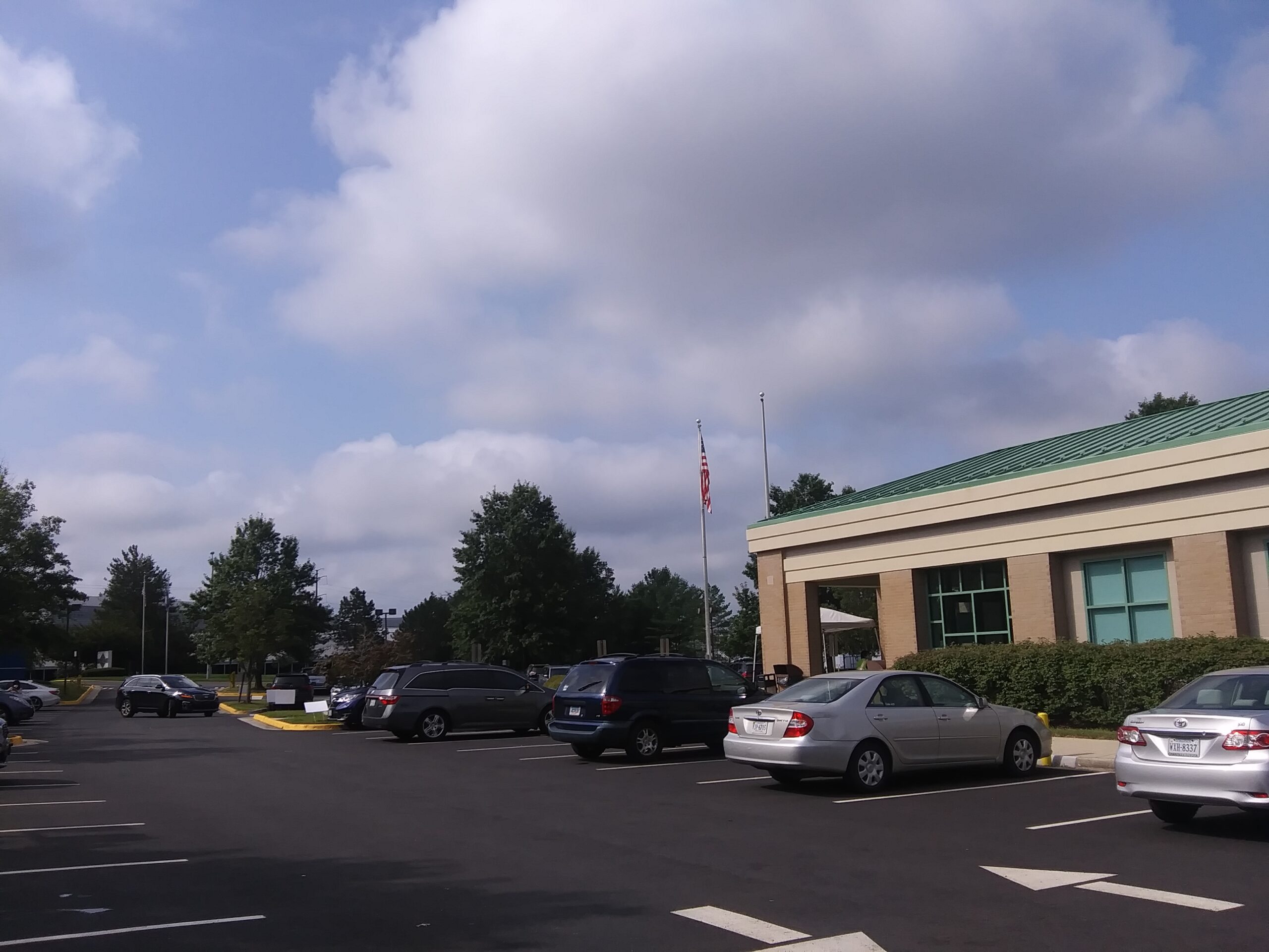 Front of the DMV with Flags