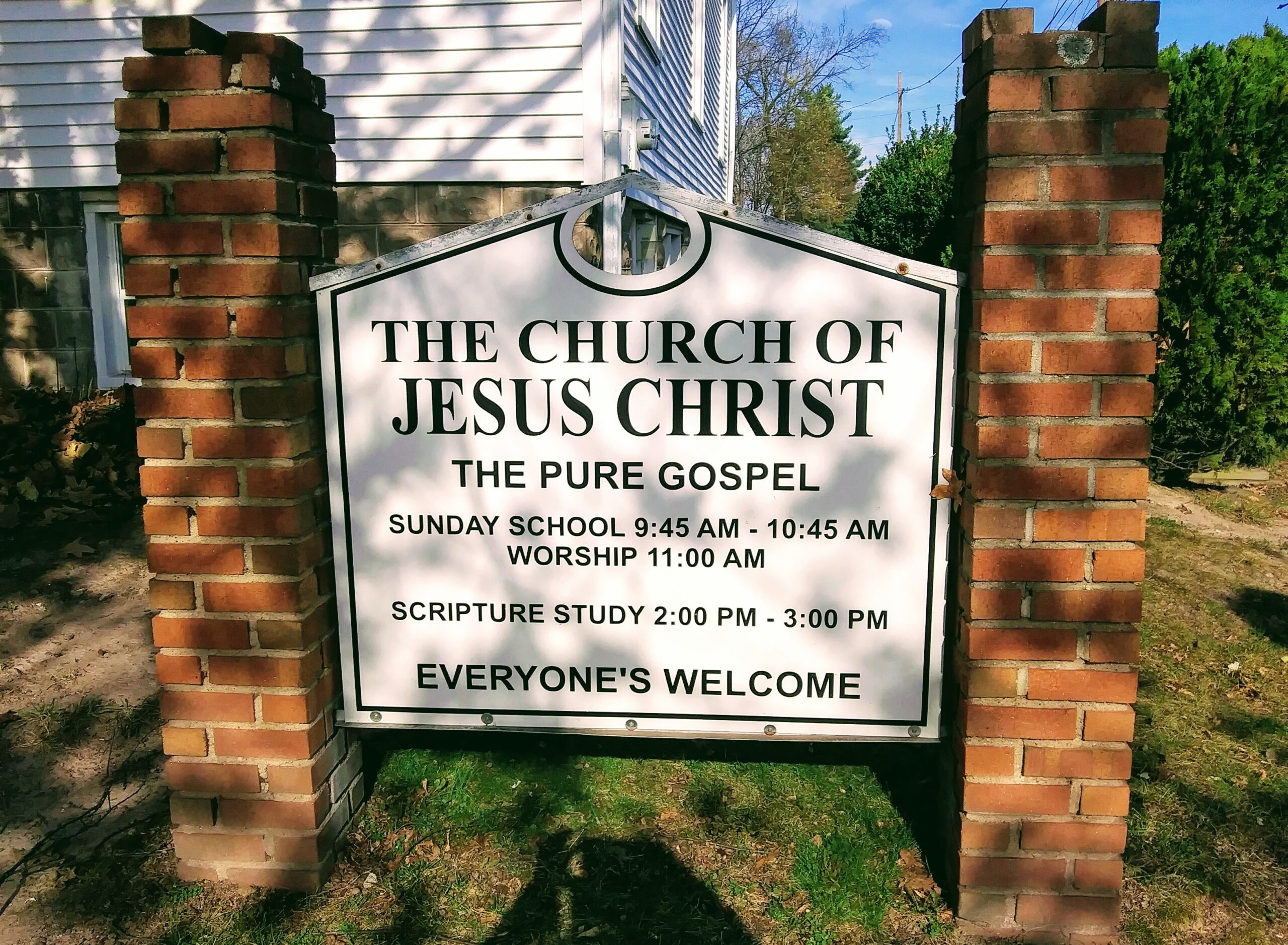 Sign in Front of the Church