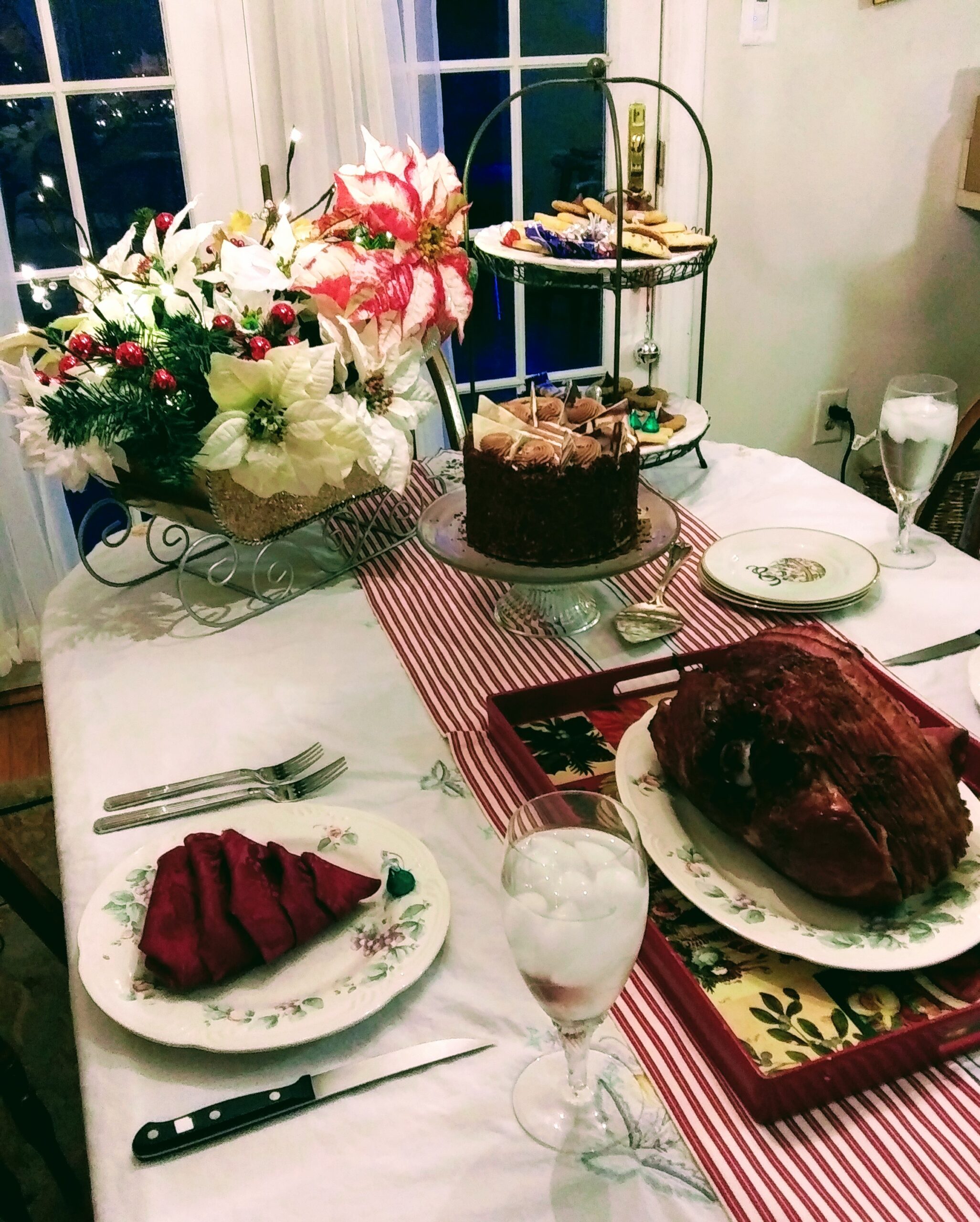 Table Setting with Poinsettia Sled Centerpiece