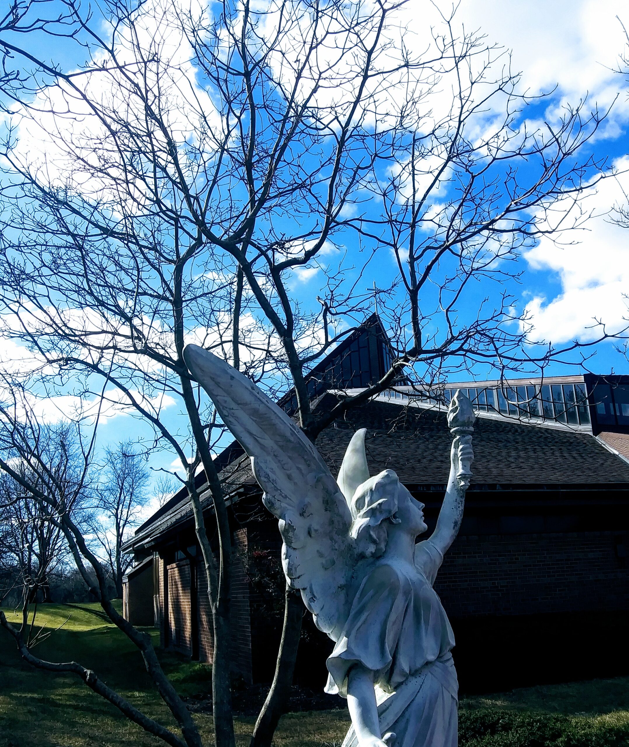 Angel Statue and Blue Sky