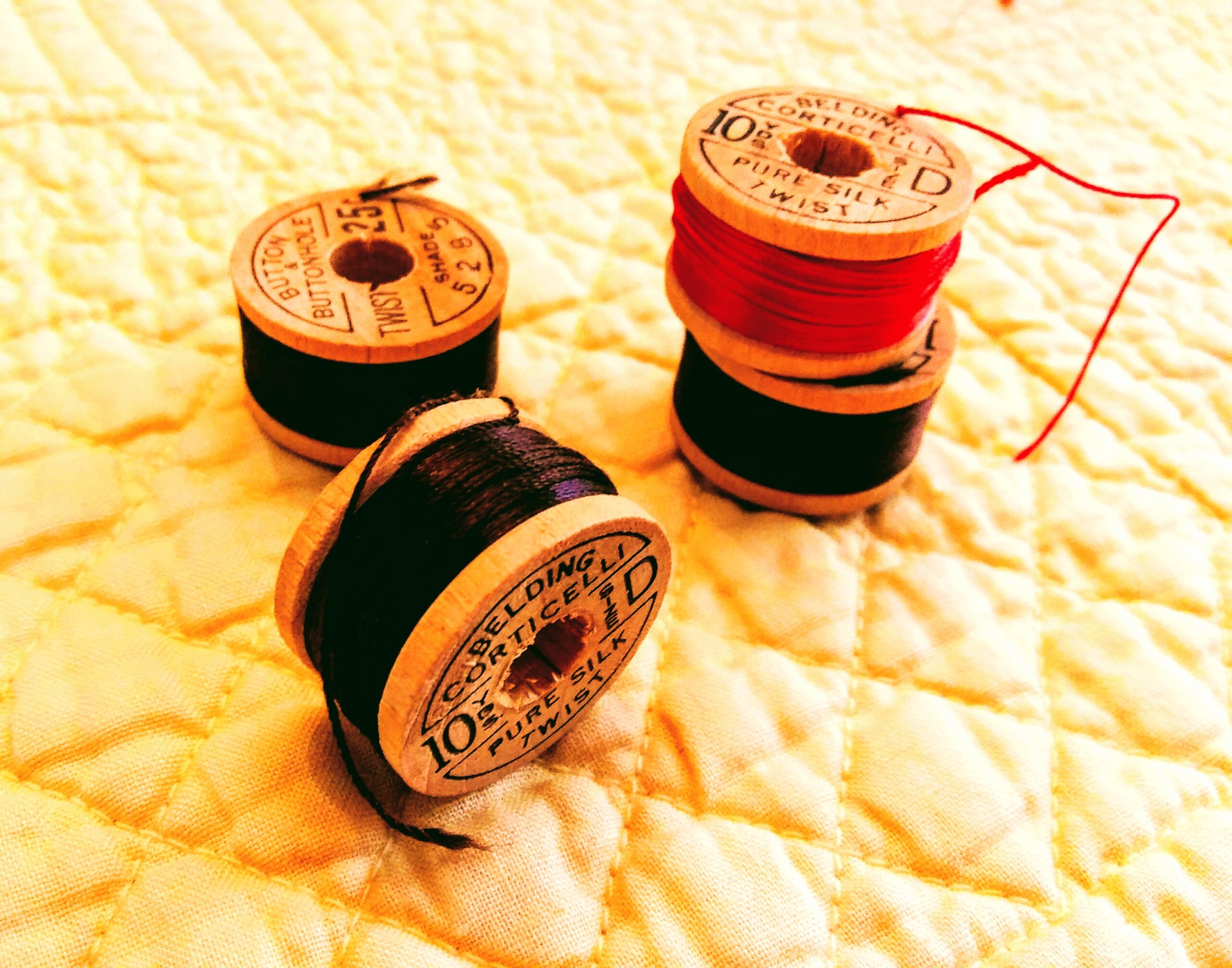 Four Wooden Spools of Corticelli Pure Silk Thread